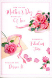 The photograph shows a graceful Mother's Day card lying flat, its artwork capturing the essence of a pink rose bouquet one might see in a Maida Vale florist's window. At the centre and edges of the card, plump pink roses are illustrated with soft realism, their petals layered and shaded to move from delicate blush at the outer edges to a deeper, more romantic rose tone towards the heart of each bloom. The roses are arranged in loose, natural groupings that appear to drift across the card, with a few petals having slipped free and scattered around in a casually elegant pattern, like the gentle trail of petals left behind after bringing flowers home from a stroll along Formosa Street. The background is light and uncluttered, lending an airy feel that allows every curve and highlight of the petals to stand out. Tiny hints of green foliage and subtle pastel shadows peek between the blooms, suggesting depth while keeping the focus firmly on the pink roses. Flowing, hand-lettered words stretch across the design, offering a tender Mother's Day message in an easy, looping script that feels intimate and sincere. The lighting is soft and even, giving the card a serene glow and ensuring no part of the design feels harsh or overly bright, much like the muted, pleasant light on a calm spring day in Little Venice. The overall impression is one of quiet celebration and heartfelt gratitude, as if the card has been chosen to accompany same-day flower delivery in Maida Vale, bringing comfort, beauty, and love to a cherished mum.